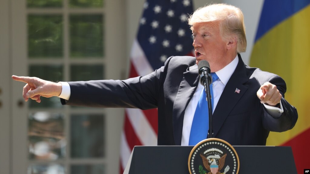 FILE - President Donald Trump speaks during a news conference in the Rose Garden at the White House, June 9, 2017.