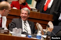 Rep. Kurt Schrader, D-Oregon) speaks to a colleague during a House Energy and Commerce Committee hearing on a potential replacement for the Affordable Care Act on Capitol Hill in Washington, March 9, 2017.