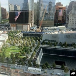 View of two giant memorial pools created in the footprints where the twin towers of the World Trade Center once stood, New York, September 11, 2011.