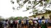 Voters queue to cast their ballots in municipal elections at a voting station near Gorongosa in central Mozambique, Nov. 20, 2013.