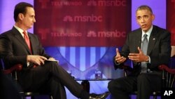 President Barack Obama speaks during a town hall meeting on immigration with journalist Jose Diaz-Balart at Florida International University in Miami, Feb. 25, 2015.