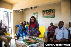 28-year-old Ndi Kato talks to a gathering of people about her intent to run for a seat in the Kaduna State parliament.