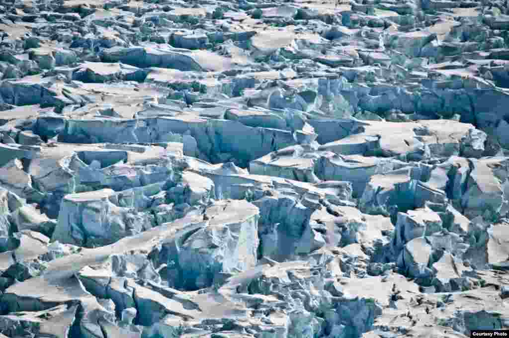 Close-up of large crevasses produced by Pine Island Glacier’s rapidly stretching ice just above its grounding line (the transition from grounded to floating ice). (Photo courtesy of Ian Joughin)