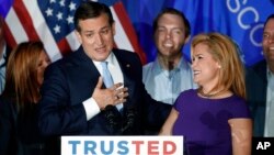 Republican presidential candidate Sen. Ted Cruz, R-Texas, speaks as his wife Heidi listens during a primary night campaign event, April 5, 2016, in Milwaukee. (AP Photo/Paul Sancya)