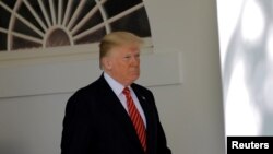 FILE - President Donald Trump during a ceremony in the Rose Garden of the White House in Washington, May 1, 2018. 