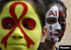 Students mark World AIDS Day in Chandigarh, India, November 30, 2015.