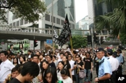 香港市民游行悼念同胞追究责任