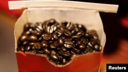 FILE - Roasting coffee beans naturally produces a carcinogen called acrylamide. A California judge found that coffee companies must warn their consumers.