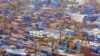 Containers are seen in a port in Singapore. Singapore expects its economy to soar 15 percent this year after a record expansion in the second quarter that suggests Asia's recovery from the global recession remains on track (File)