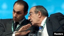 Gamal Mubarak, left, son of former Egyptian leader Hosni Mubarak, with Zakaria Azmy, Cairo, Oct. 31, 2009.