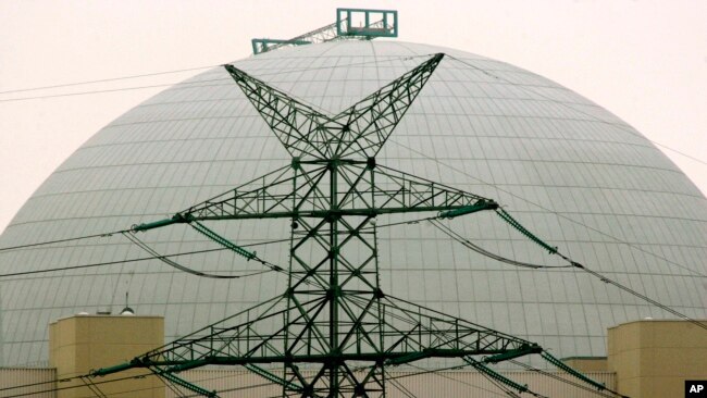 This file photo shows a nuclear power plant located in Brokdorf, northern Germany, on Nov. 22, 2006. (AP Photo/Heribert Proepper, file)