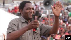 FILE - In this January, 2015 photo, Hakainde Hichilema, of the Zambia opposition United Party for National Development addresses an election rally in Lusaka, Zambia.
