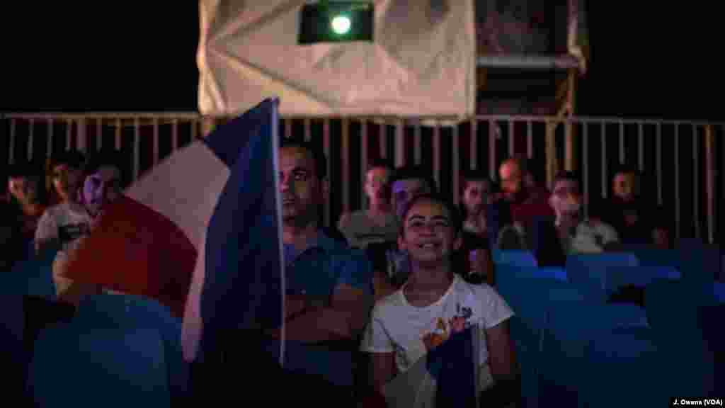 A father and daughter take in France's opening game together. The European championships are being held across the country. 