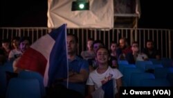 A father and daughter take in France's opening game together. The European championships are being held across the country. 