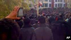 Tibetans protest in the Rongwo Township in Rebkhong County in western China's Qinghai province, November 9, 2012.