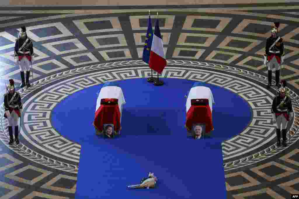 Republican Guards stand around the coffins of former French politician and Holocaust survivor Simone Veil and her husband Antoine Veil as visitor pay their respects following a ceremony at the Pantheon in Paris. Former Health Minister, Simone Veil, who passed away on June 30, 2017, became president of the European Parliament and one of France&#39;s most revered politicians by advocating the 1975 law legalizing abortion in France. She will be the fifth woman buried at the monument to France&#39;s dignitaries, where she will be laid to rest at the Pantheon with her husband Antoine, a high-ranking civil servant who died in 2013.