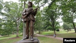 A statue of a Confederate soldier nicknamed Silent Sam stands on the campus of the University of North Carolina in Chapel Hill, N.C., Aug. 17, 2017.
