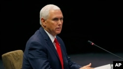 U.S. Vice President Mike Pence delivers his opening statement at the start of the ASEAN-US Summit in the ongoing 33rd ASEAN Summit and Related Summits Thursday, Nov. 15, 2018 in Singapore.