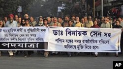 Indian intellectuals and others walk in a rally demanding immediate release of human rights activist Dr. Binayak Sen, in Calcutta, India, 11 Jan 2011