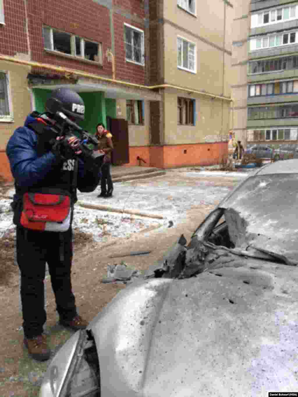 Damage from an artillery attack is seen in a residential area of Kramatorsk, eastern Ukraine, Feb. 10, 2015.