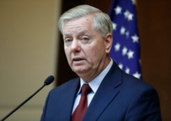 FILE - Republican Sen. Lindsey Graham speaks to reporters in Ankara, Turkey, Jan. 19, 2019.