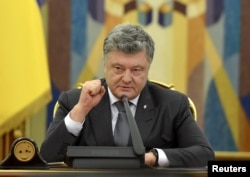 FILE - Ukrainian President Petro Poroshenko speaks during a meeting of the country's Security and Defence Council in Kyiv, May 2, 2018. (Ukrainian Presidential Press Service)