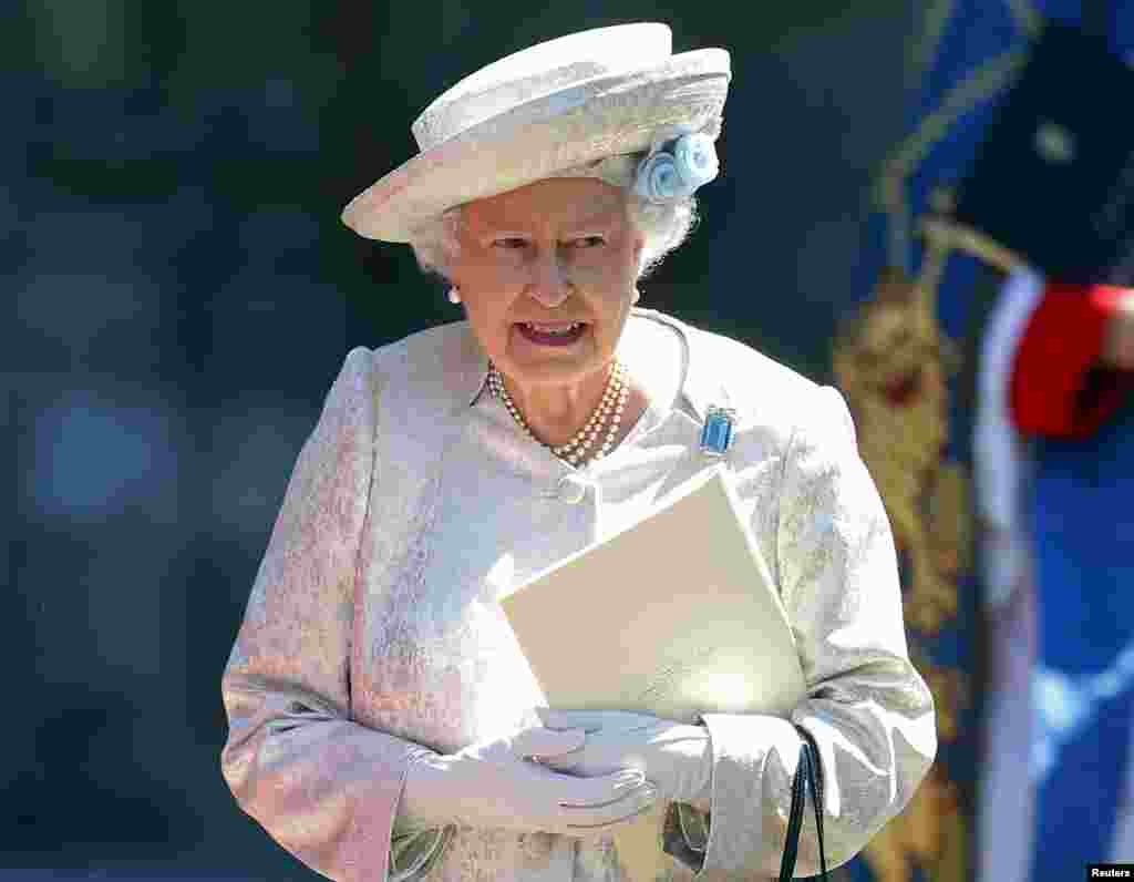 Britain's Queen Elizabeth leaves Westminster Abbey after celebrating the 60th anniversary of her coronation in London.