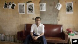 Youk Chhang, head of the Documentation Center of Cambodia (DC-CAM), in Tuol Sleng school, a former Khmer Rouge interrogation center turned into a museum, where many of the documents he is researching still are stored.