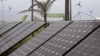 Solar panels are used to generate electricity at the Greenpeace exhibit during the climate change conference in Durban, South Africa, Tuesday, Nov 29, 2011. 