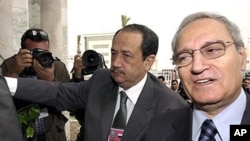 Syrian Vice President Farouk al-Sharaa, right (file photo)