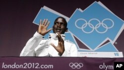 Marathon runner Guor Marial, who is stateless, appears during a news conference at the 2012 Summer Olympics, in London, August 10, 2012.