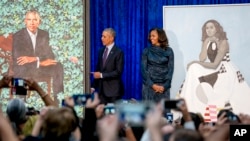 El ex presidente Barack Obama y su esposa Michelle durante la presentación de sus retratos oficiales en la National Portrait Gallery en Washington, D.C. Febrero 12, 2018.