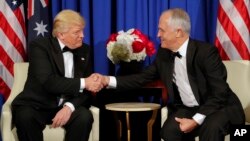 President Donald Trump and Australian Prime Minister Malcolm Turnbull shake hands during their meeting aboard the USS Intrepid, a decommissioned aircraft carrier docked in the Hudson River in New York, May 4, 2017.