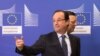 European Commission President Jose Manuel Barroso (R) walks near France's President Francois Hollande during a conference of the Donor Conference for development in Mali on May 15, 2013 at the EU Headquarters in Brussels. 