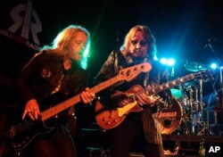 Chris Wyse, left, and Ace Frehley perform in concert at The Chameleon Club on Tuesday, Oct. 4, 2016, in Lancaster, Pa.