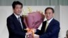 Jošihide Suga na putu da postane novi premijer Japana