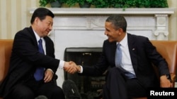지난해 2월 미국 백악관에서 바락 오바마 미국 대통령(오른쪽)이 당시 중국 국가 부주석으로 미국을 방문한 시진핑과 회담했다.