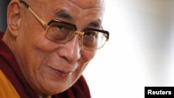 Tibetan spiritual leader the Dalai Lama speaks at a news conference in Yokohama, south of Tokyo November 5, 2012. 