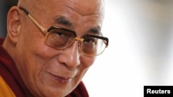 FILE - Tibetan spiritual leader the Dalai Lama, Nov 5, 2012. 