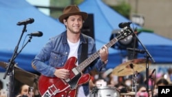 FILE - In this May 29, 2017, file photo, singer Niall Horan performs on NBC's "Today" show in New York. Horan will join Ariana Grande at a charity concert called "One Love Manchester" in Manchester, England, June 3, 2017.
