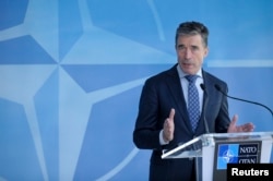 FILE - NATO Secretary-General Anders Fogh Rasmussen holds a news conference at the Alliance's headquarters in Brussels, Apr. 16, 2014.