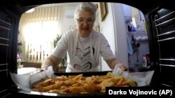 Granny Jela shows millions how to cook online