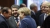 Европейские лидеры пытаются урегулировать долговой кризис