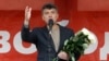 FILE - Boris Nemtsov addresses supporters during a protest rally in Moscow, May 6, 2013.