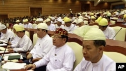 Lower House lawmakers attend a regular session of parliament in Naypyitaw, Burma, April 23, 2012.