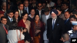 Indian External Affairs minister Sushma Swaraj (C) arrives at Tribhuwan International Airport, Kathmandu, Nepal, Feb. 1, 2018. 