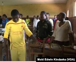 Students gather in class at the Presbyterian School of Science and Technology after fellow students and their principal were kidnapped in Bafut, near Bamenda, Cameroon, Nov. 5, 2018.
