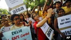 Protesting recent rapes, dozens of All India Students Association members demonstrate outside police headquarters in New Delhi, India, Oct. 18, 2015. 