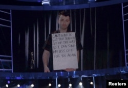 Sam Smith appears on tape to accept the award for top male artist, as he recovers from vocal cord surgery at the 2015 Billboard Music Awards in Las Vegas, Nevada, May 17, 2015