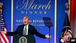 FILE - President Donald Trump speaks to the National Republican Congressional Committee March Dinner at the National Building Museum in Washington, March 20, 2018. Trump, a constant critic of what he calls “fake news,” will skip the White House Correspondents’ Dinner for a second year in a row. 